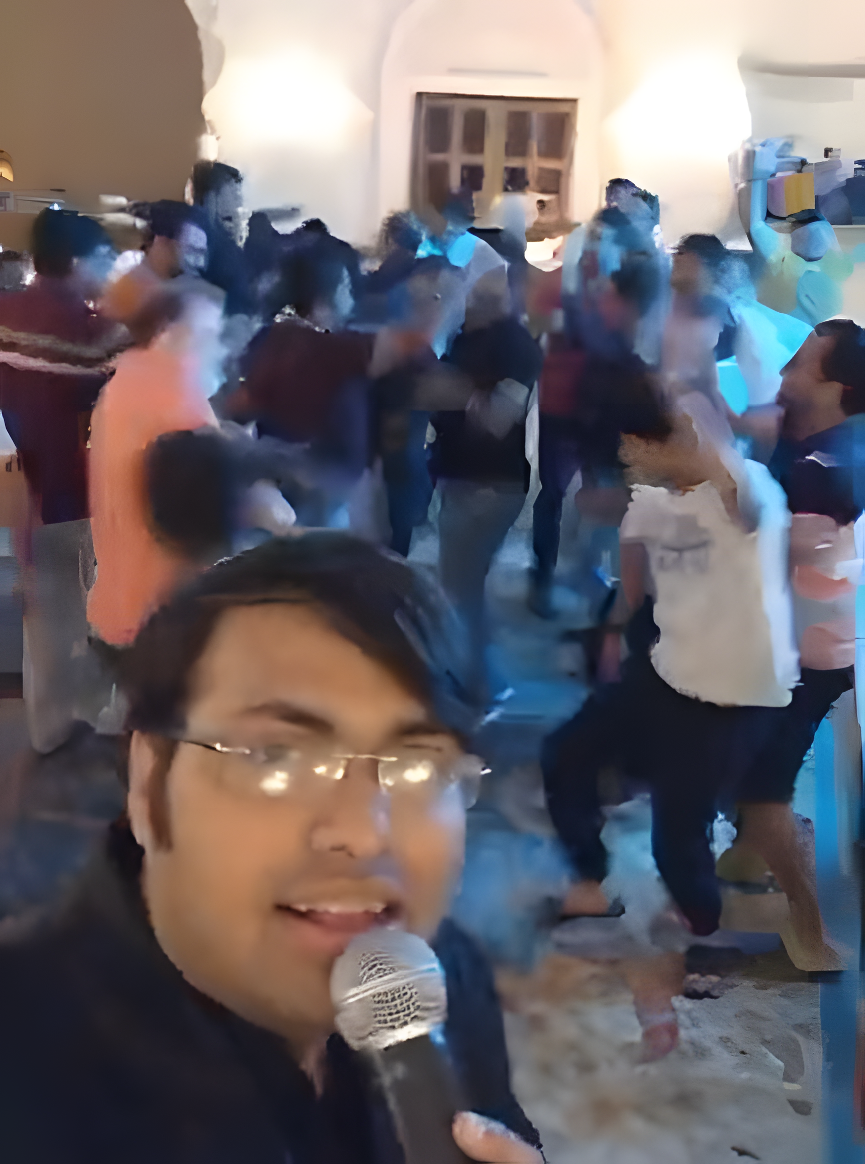 Dr. Arpit Deliwala with cheering crowd at live show